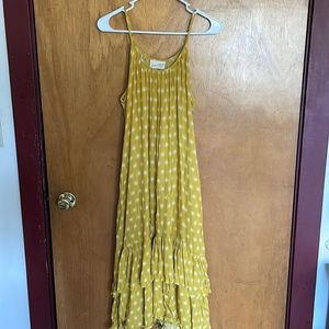 Yellow flows sundress with a fun sun pattern!
